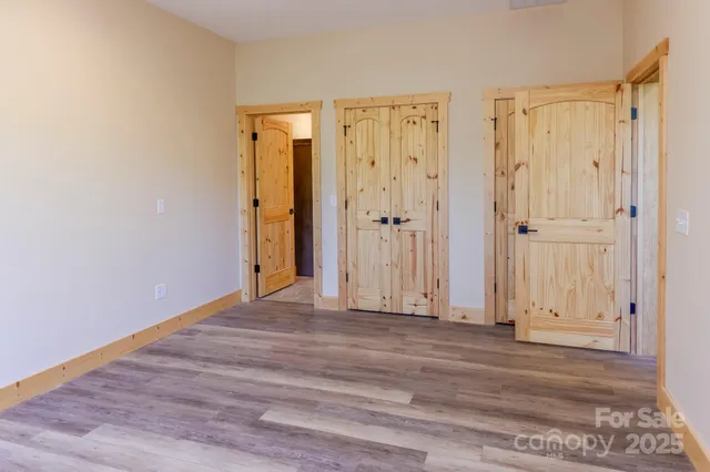 a bathroom with a double vanity sink mirror and shower