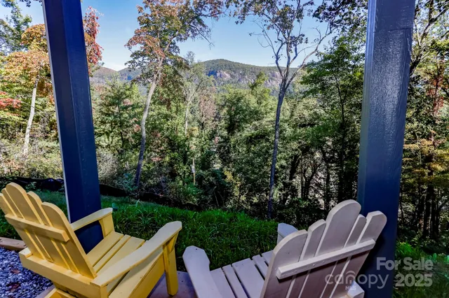 a view of balcony with yard