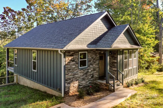 a house with trees in the background