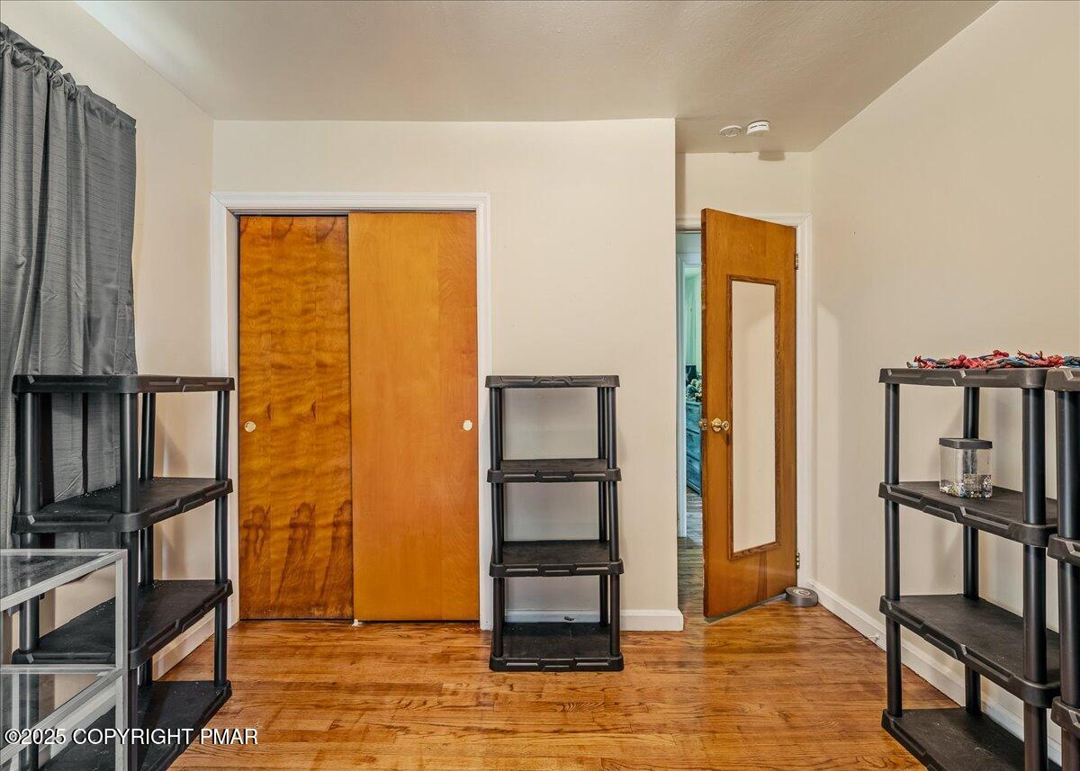 119 Knob Road Mount Pocono, PA 18344 - Photo 21 of 34 a view of a hallway with wooden floor and entryway