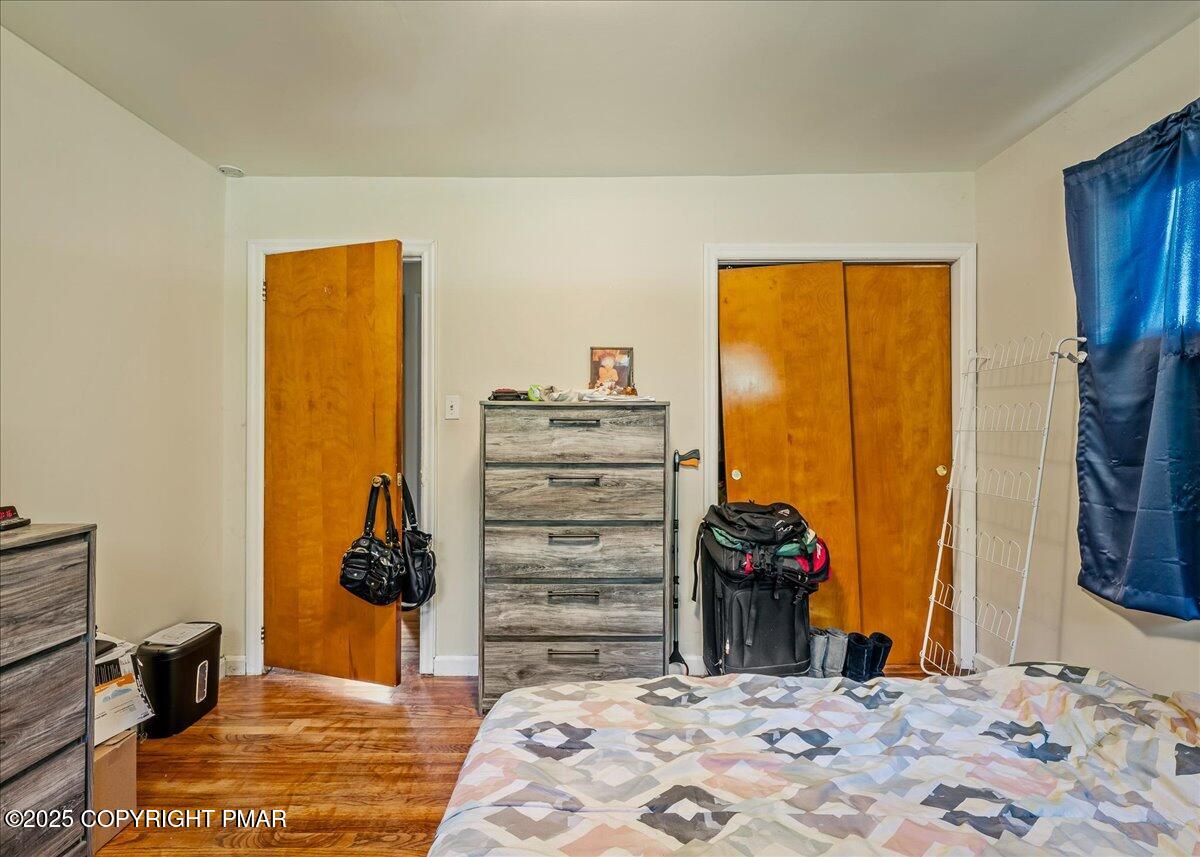119 Knob Road Mount Pocono, PA 18344 - Photo 23 of 34 a bedroom with a bed and a closet