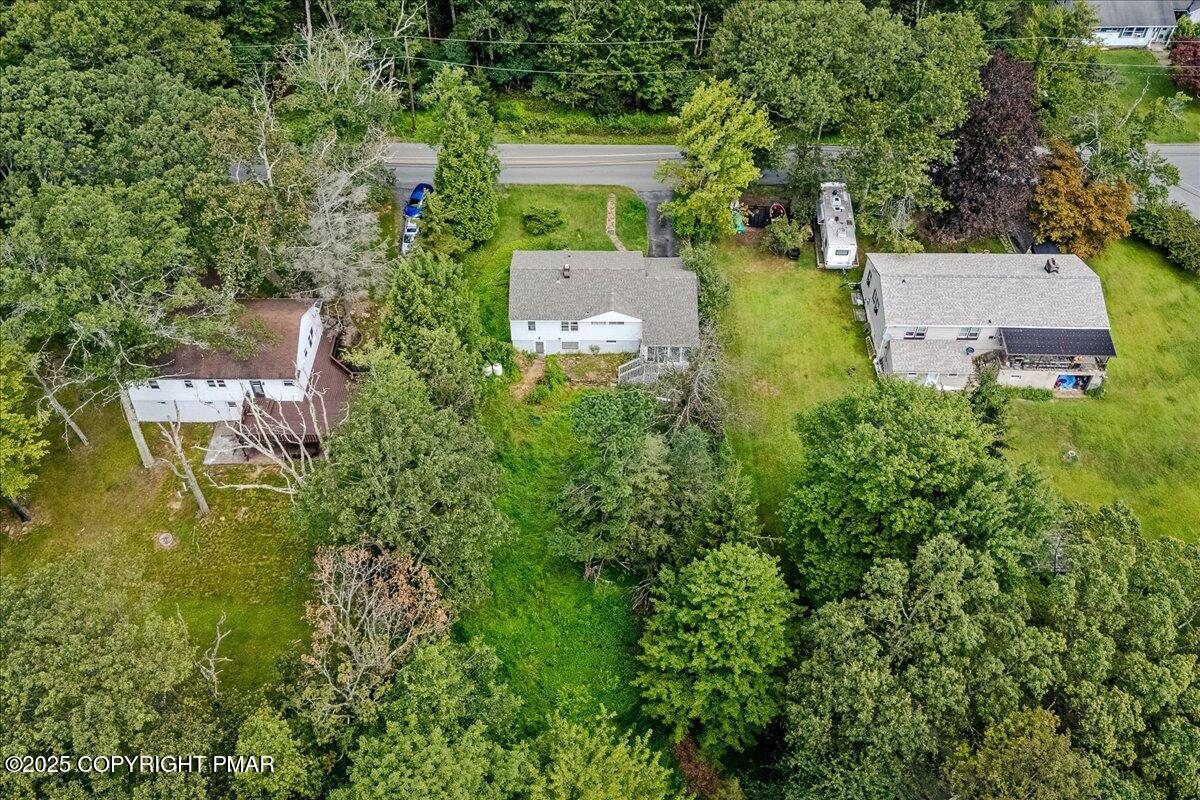 119 Knob Road Mount Pocono, PA 18344 - Photo 4 of 34 an aerial view of a house with a garden