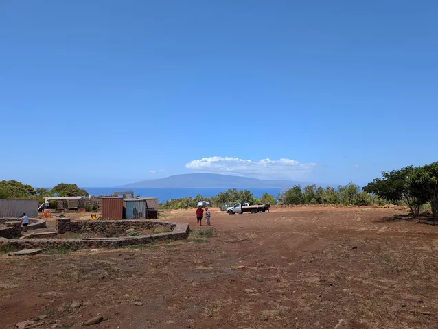 a view of beach and a mountain