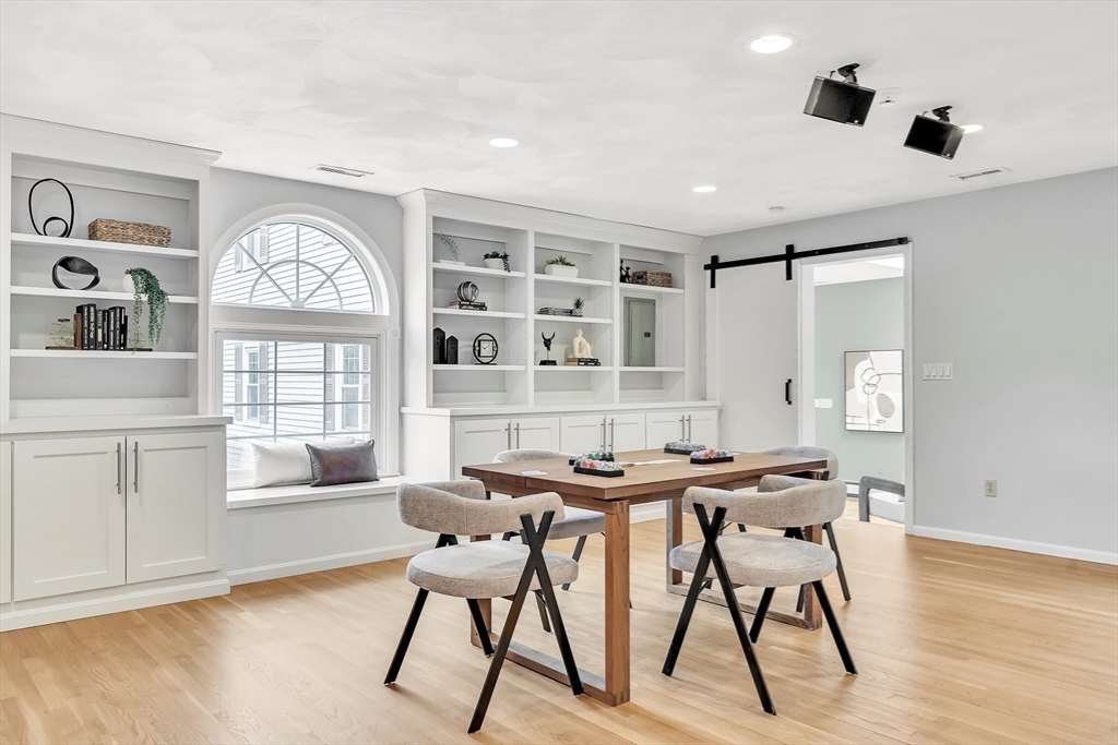 3 Bellantoni Drive Acton, MA 01720 - Photo 15 of 40 a view of a dining room with furniture window and wooden floor