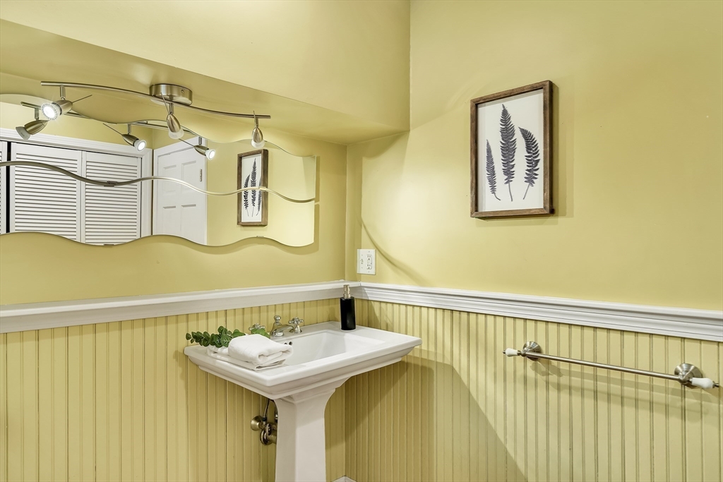 3 Bellantoni Drive Acton, MA 01720 - Photo 18 of 40 a bathroom with a sink and a mirror