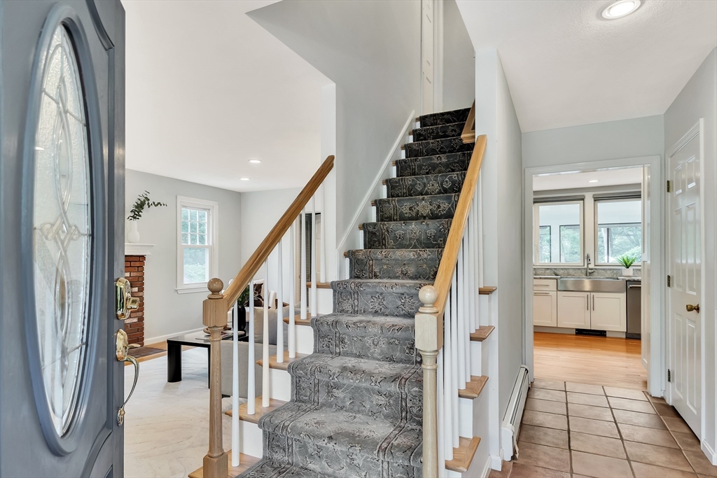 3 Bellantoni Drive Acton, MA 01720 - Photo 3 of 40 a view of entryway and hall with wooden floor