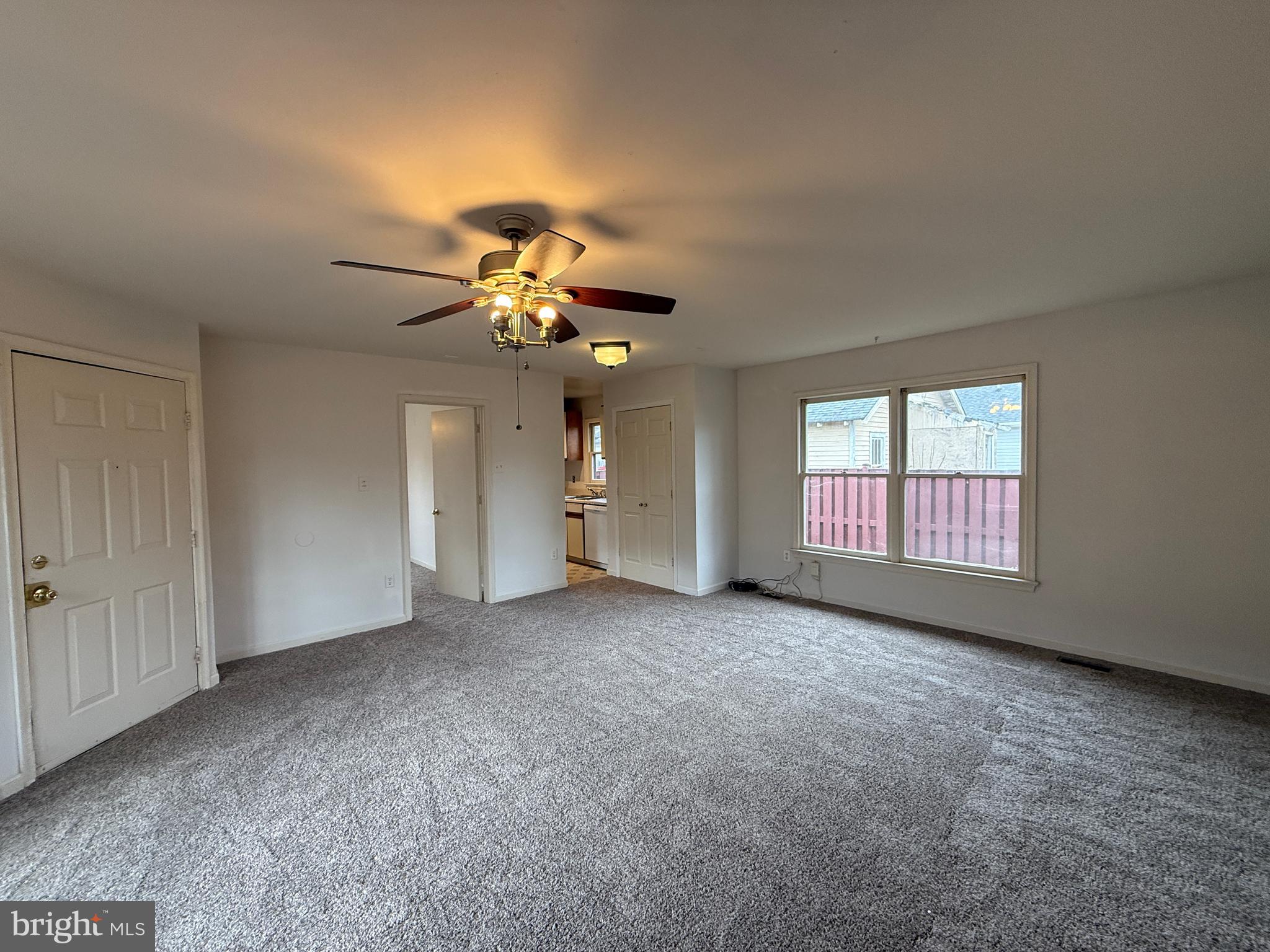 227 Bend Farm Road Fredericksburg, VA 22408 - Photo 5 of 22 a view of a livingroom with a chandelier fan and windows
