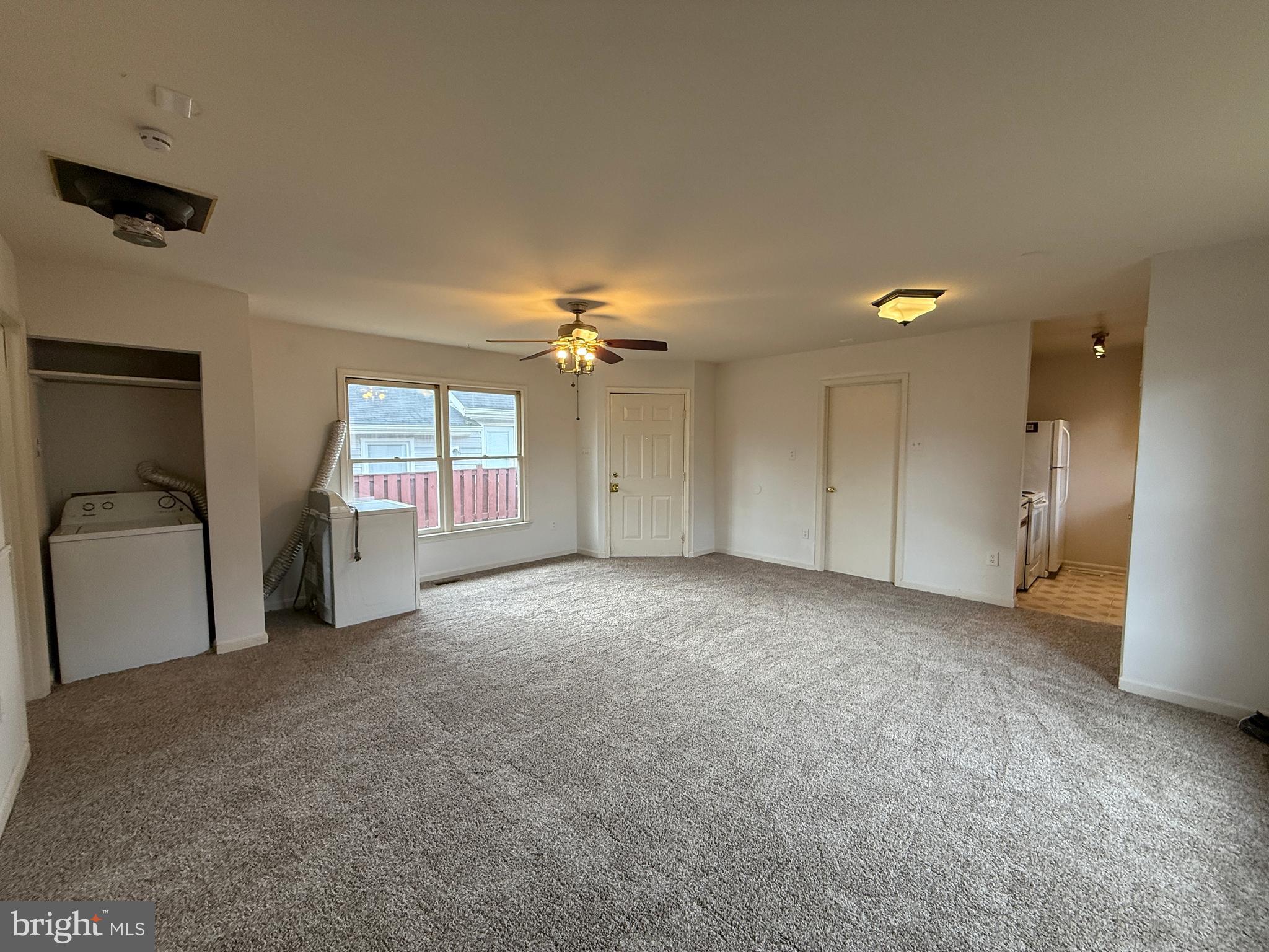 227 Bend Farm Road Fredericksburg, VA 22408 - Photo 7 of 22 an empty room with windows and cabinet