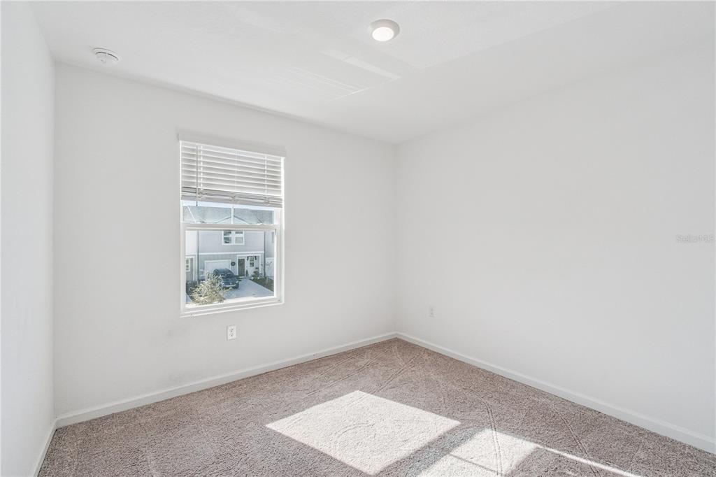 5931 Chestnut Grv Place St. Cloud, FL 34771 - Photo 16 of 20 an empty room with a window