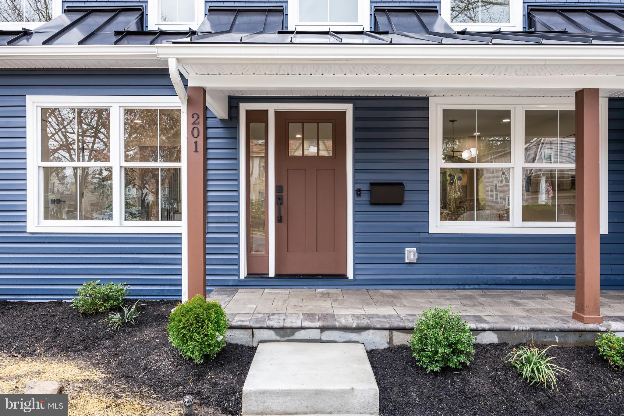 201 Centre Street Haddonfield, NJ 08033 - Photo 2 of 48 a front view of a house with a yard
