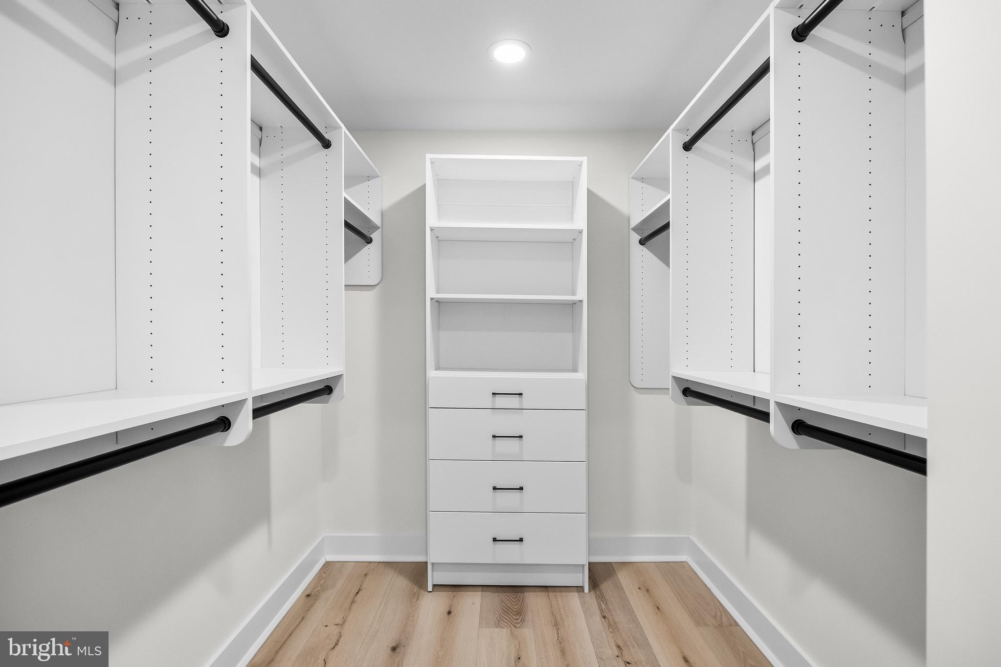 201 Centre Street Haddonfield, NJ 08033 - Photo 27 of 48 a view of walk in closet with empty racks