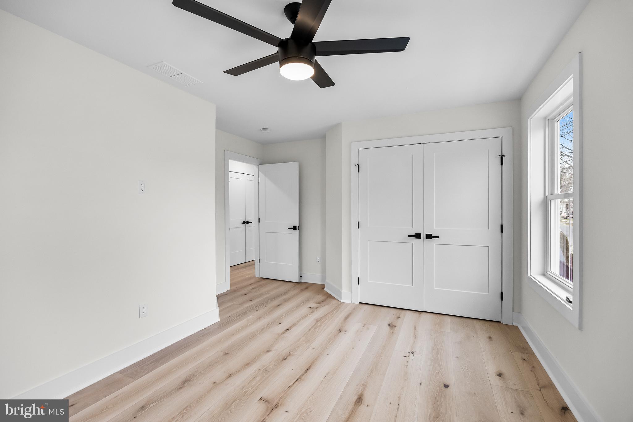 201 Centre Street Haddonfield, NJ 08033 - Photo 29 of 48 a view of a room with wooden floor and white walls