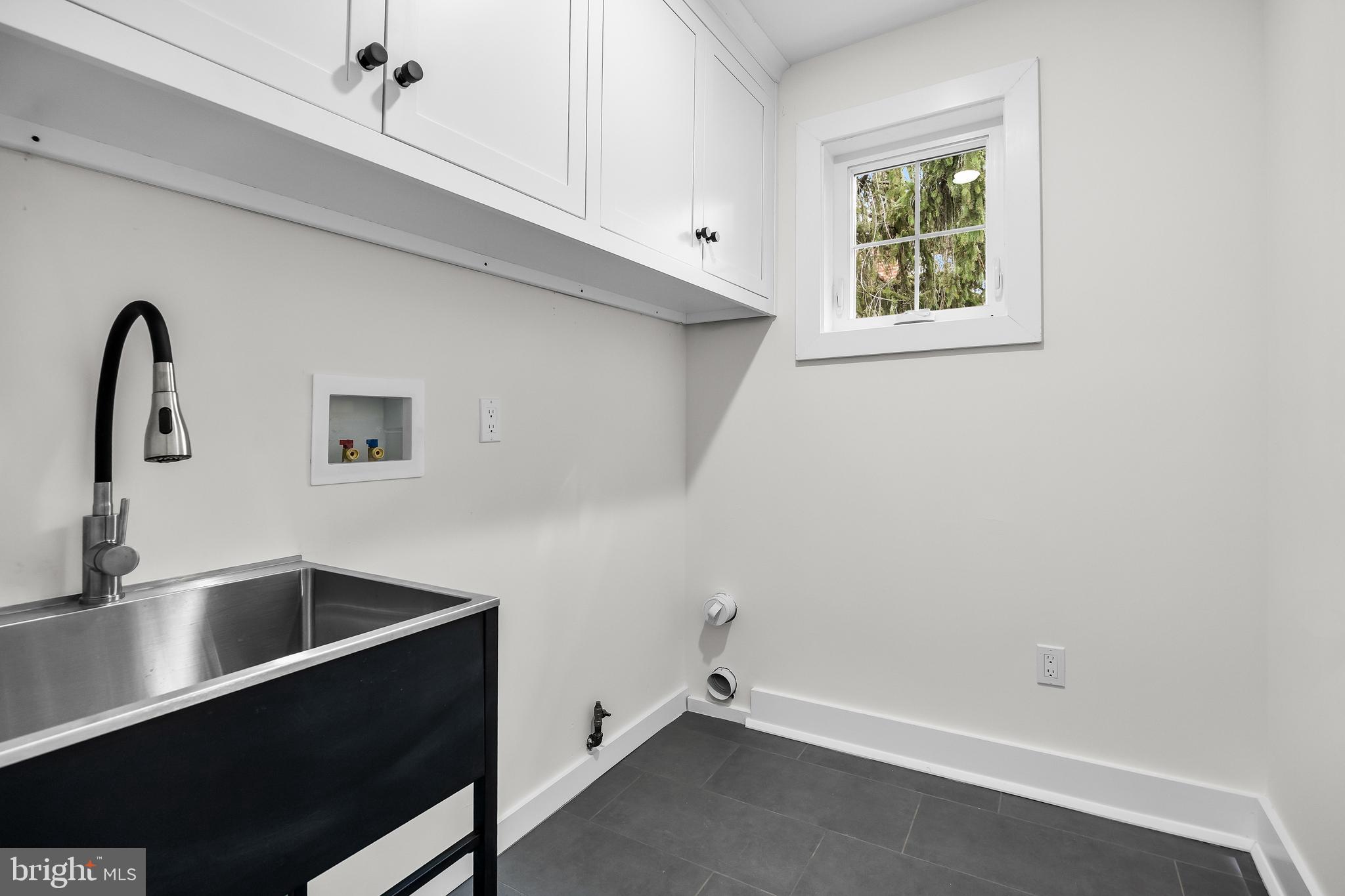 201 Centre Street Haddonfield, NJ 08033 - Photo 32 of 48 a view of storage and utility room with window