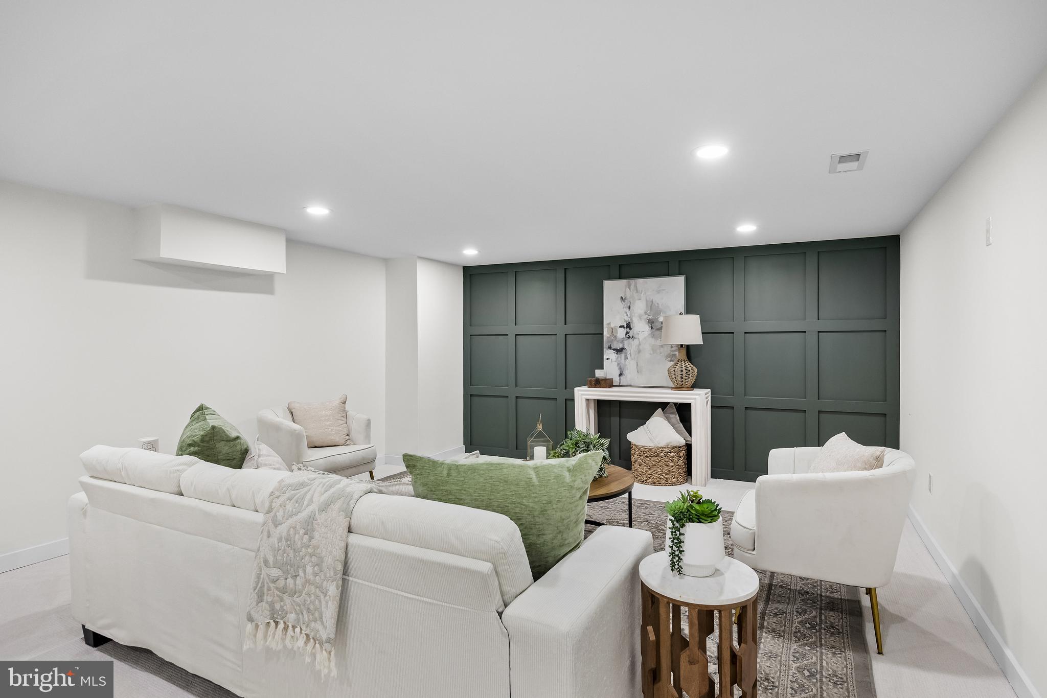 201 Centre Street Haddonfield, NJ 08033 - Photo 35 of 48 a living room with furniture and fireplace