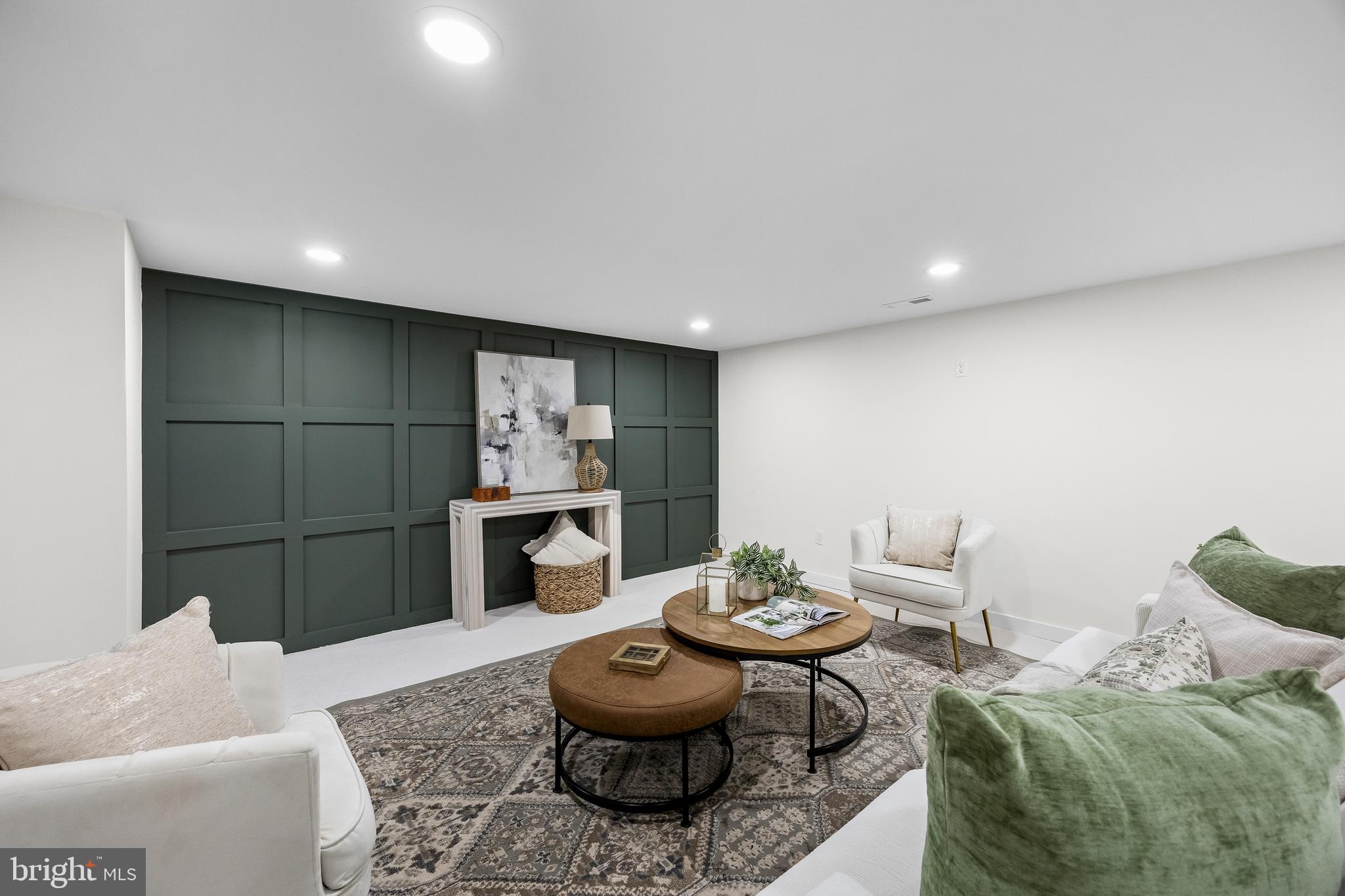 201 Centre Street Haddonfield, NJ 08033 - Photo 36 of 48 a living room with furniture and a fireplace