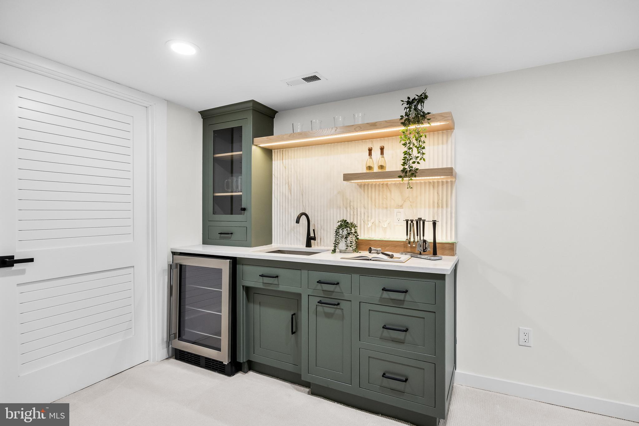 201 Centre Street Haddonfield, NJ 08033 - Photo 39 of 48 a kitchen with cabinets appliances and a sink