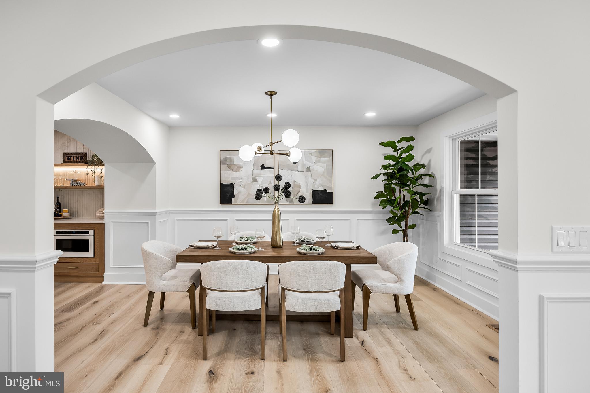 201 Centre Street Haddonfield, NJ 08033 - Photo 6 of 48 a view of a dining room with furniture and wooden floor