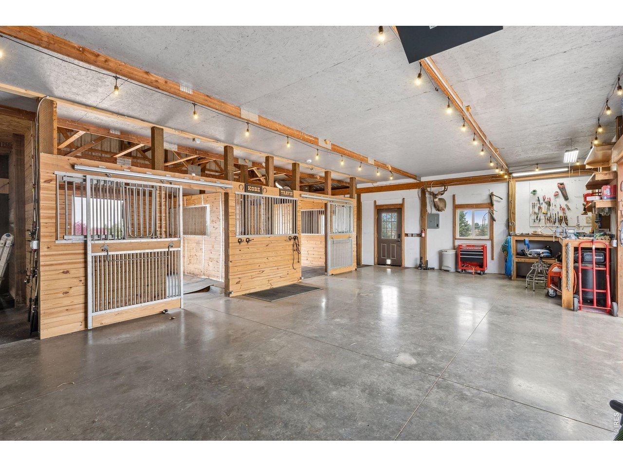 9421 Gunbarrel Ridge Road Boulder, CO 80301 - Photo 37 of 50 New floors and stalls in horse barn