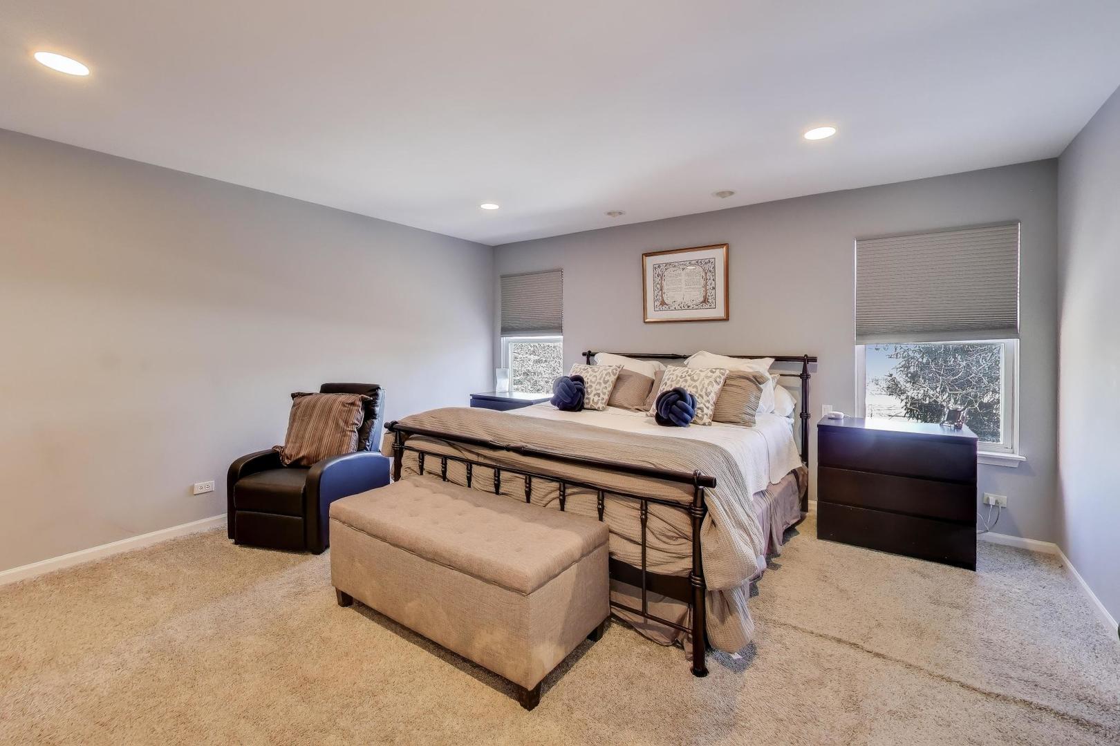 773 Sarah Lane Northbrook, IL 60062 - Photo 13 of 29 a bedroom with a bed and a couch