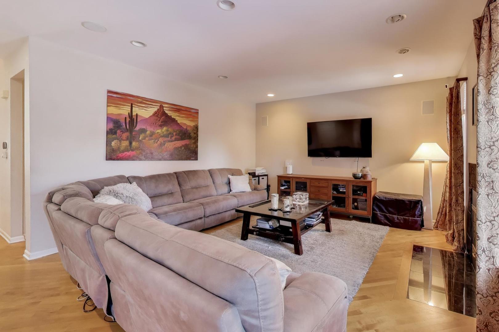 773 Sarah Lane Northbrook, IL 60062 - Photo 4 of 29 a living room with furniture and a flat screen tv