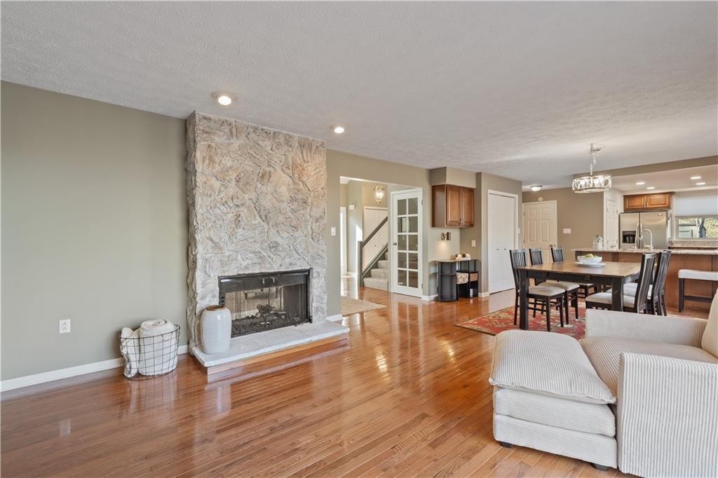 271 Shafer Road Coraopolis, PA 15108 - Photo 13 of 50 With stunning hardwood floors, fresh neutral paint, and a charming stone fireplace, the family room exudes warmth and comfort.