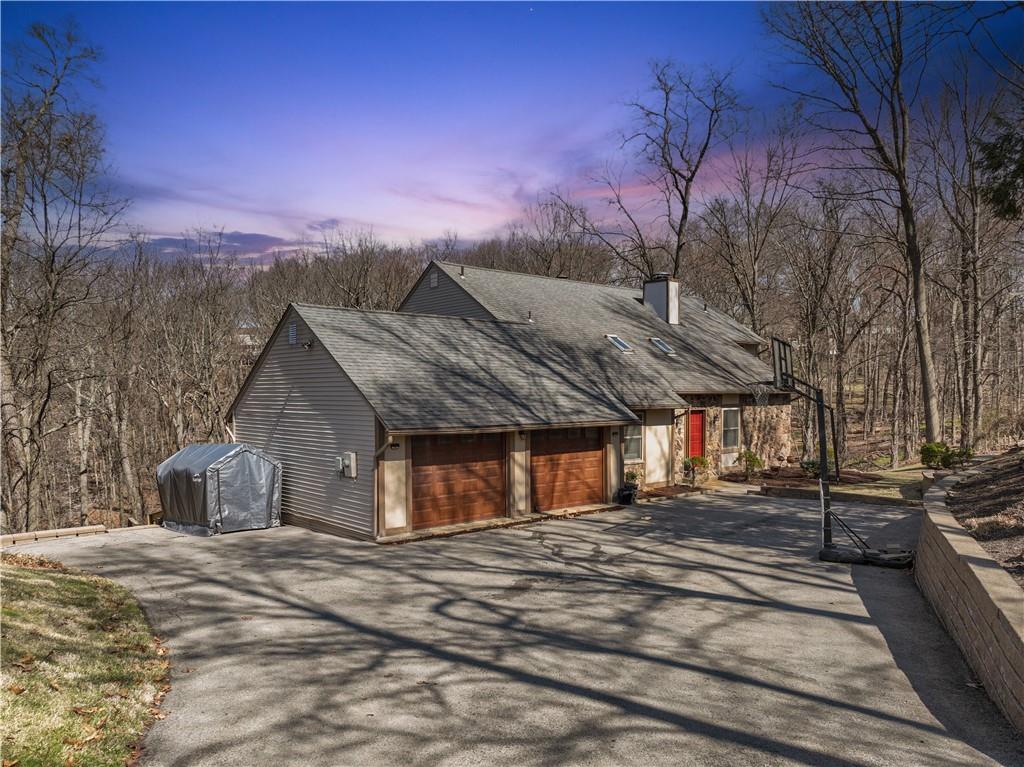 271 Shafer Road Coraopolis, PA 15108 - Photo 2 of 50 Nestled on 2.5 acres of picturesque wooded landscape, this home offers breathtaking views and ultimate tranquility.