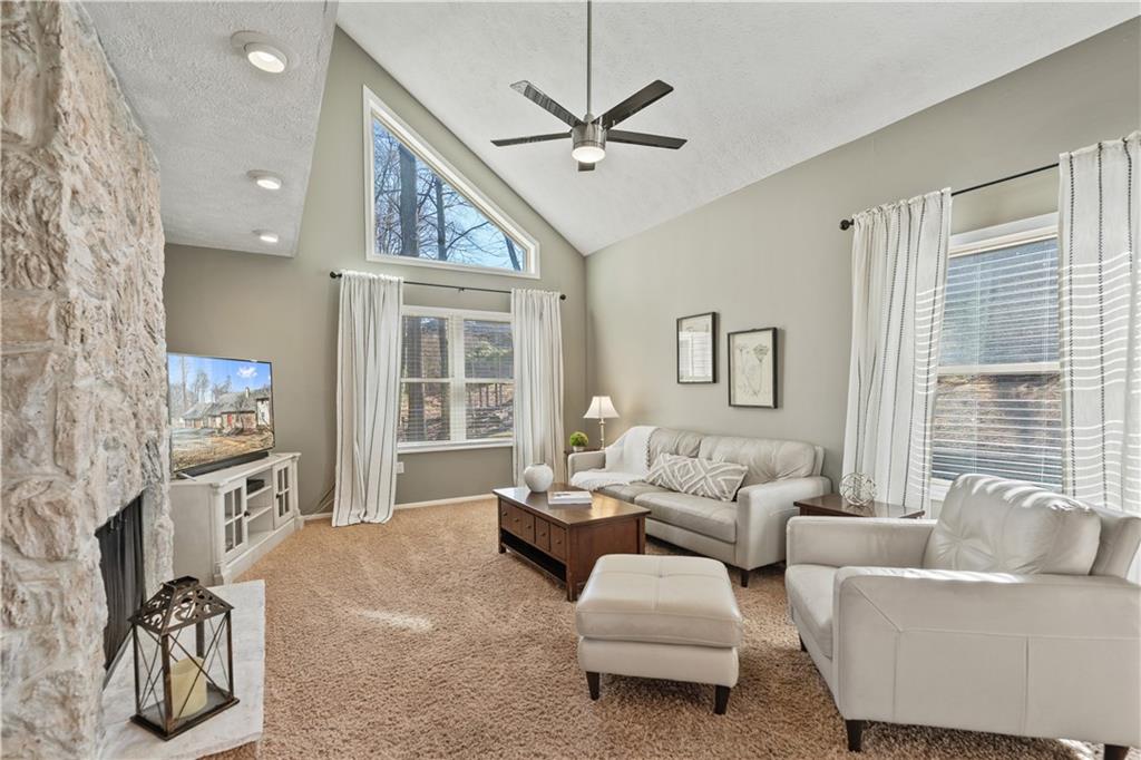 271 Shafer Road Coraopolis, PA 15108 - Photo 5 of 50 Enjoy the beauty of nature from the comfort of your living room where soaring vaulted ceilings and expansive windows flood the space with natural light and showcase stunning wooded views.