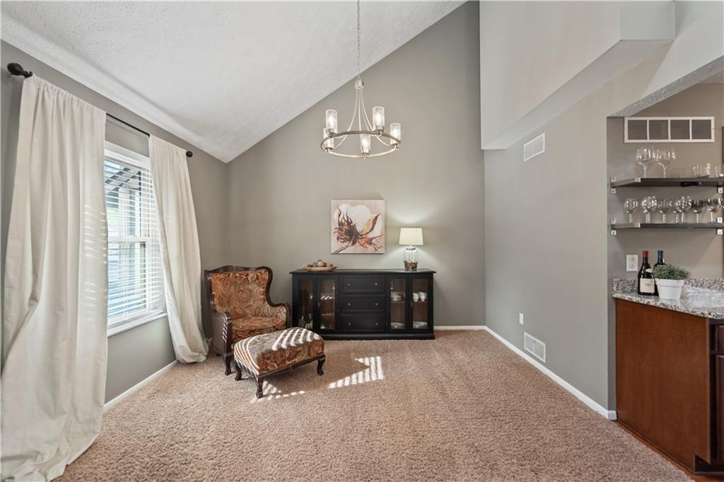 271 Shafer Road Coraopolis, PA 15108 - Photo 7 of 50 The spacious dining room seamlessly flows into the kitchen, creating the perfect setting for effortless entertaining.