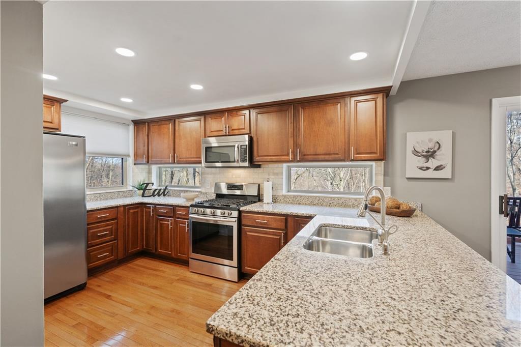 271 Shafer Road Coraopolis, PA 15108 - Photo 8 of 50 The kitchen is a true showpiece, featuring fresh paint, new recessed lighting, and sleek granite countertops.