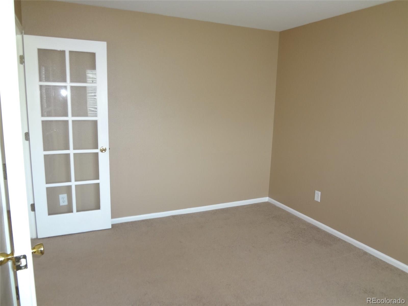 9709 South Castle Ridge Circle Highlands Ranch, CO 80129 - Photo 10 of 21 a view of an empty room