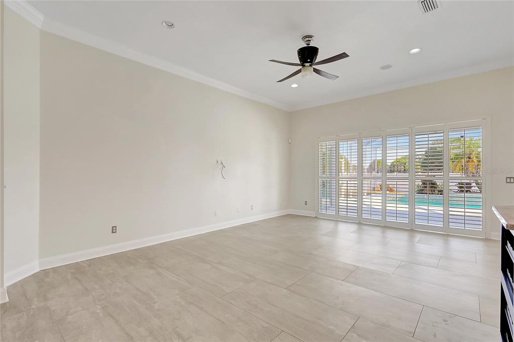 2863 Duncan Tree Circle Valrico, FL 33594 - Photo 31 of 53 wooden floor in an empty room with a window