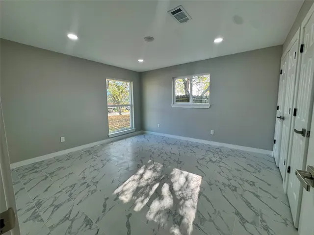 a bathroom with a sink toilet and a mirror