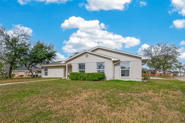 a house view with a garden space