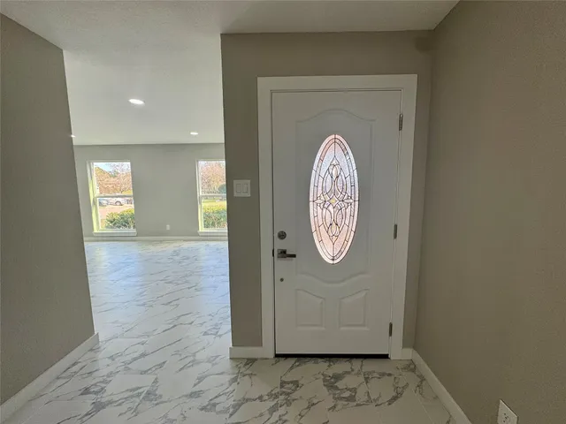 a view of a hallway with elevator