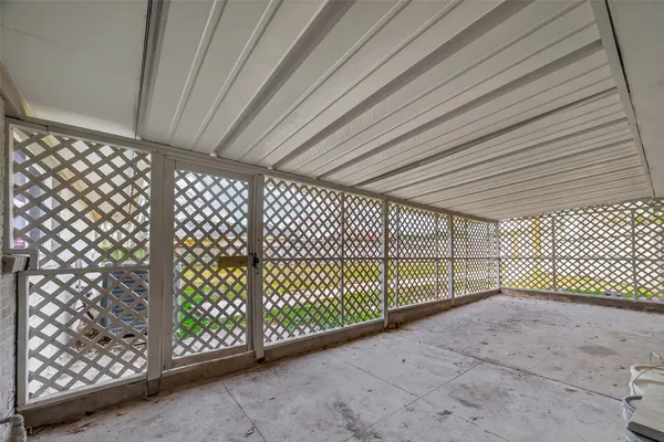 a view of a backyard of the house