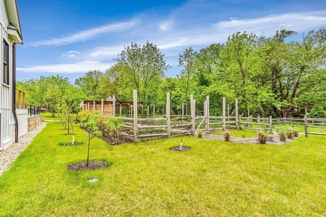 a view of a swimming pool with a garden