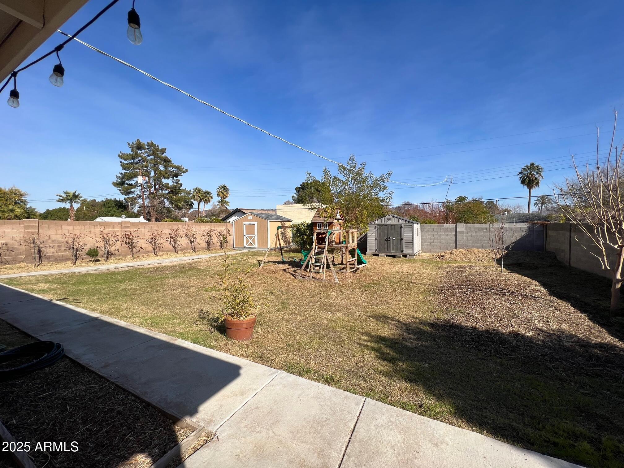 6711 North 14th Place Phoenix, AZ 85014 - Photo 21 of 27 a view of a swimming pool with a lounge chair