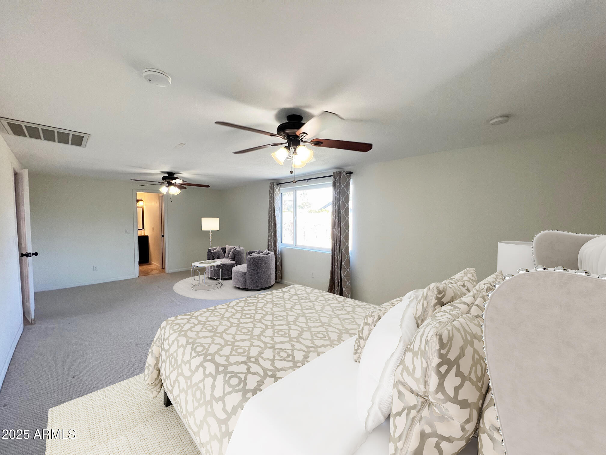 6711 North 14th Place Phoenix, AZ 85014 - Photo 9 of 27 a spacious bedroom with a bed a chandelier and a dresser