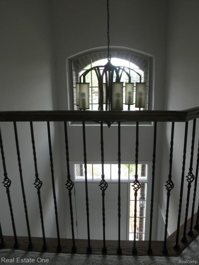 4091 Plum Lane Rochester, MI 48306 - Photo 14 of 44 2-story foyer, note the decorative wrought iron spindles throughout