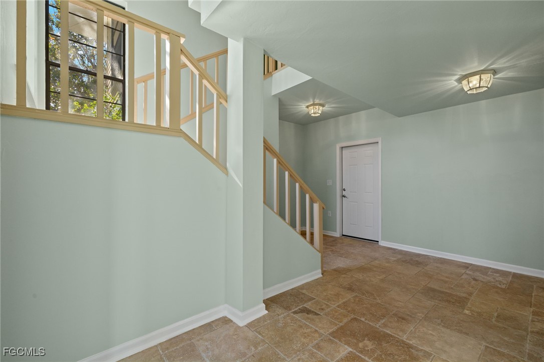 4631 Bowen Bayou Road Sanibel, FL 33957 - Photo 5 of 39 a view of an entryway with staircase