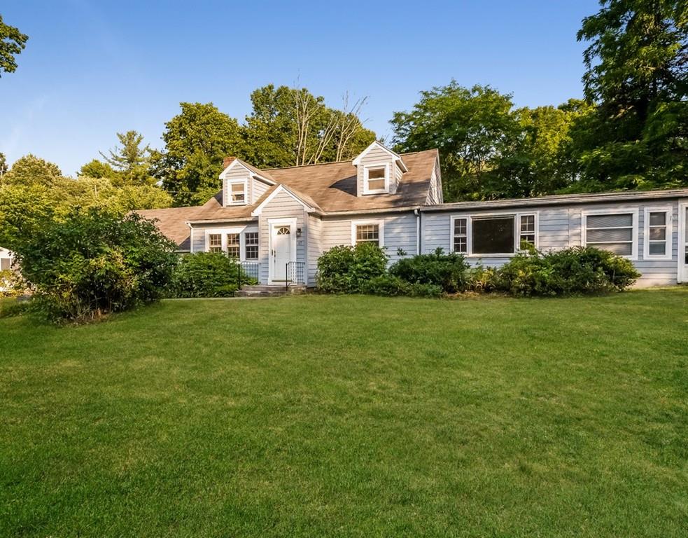 17 Nashoba Road Acton, MA 01720 - Photo 1 of 26 a front view of a house with a garden