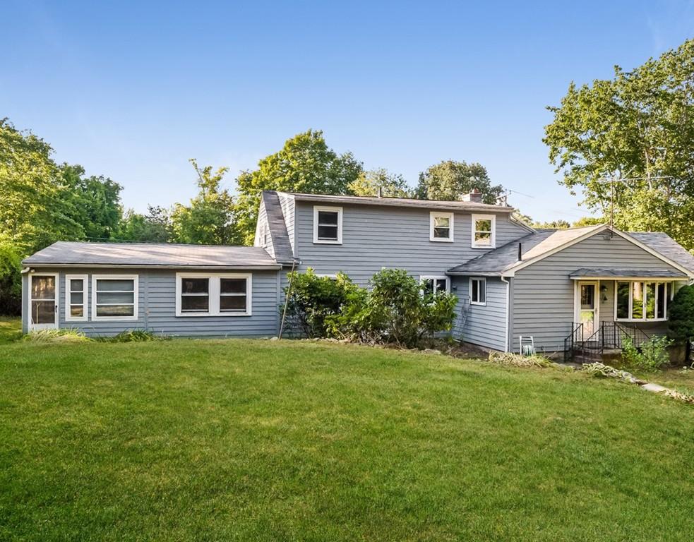 17 Nashoba Road Acton, MA 01720 - Photo 25 of 26 a front view of a house with a yard