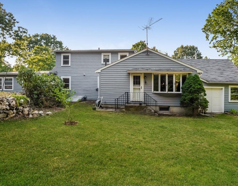 17 Nashoba Road Acton, MA 01720 - Photo 26 of 26 a front view of a house with a yard