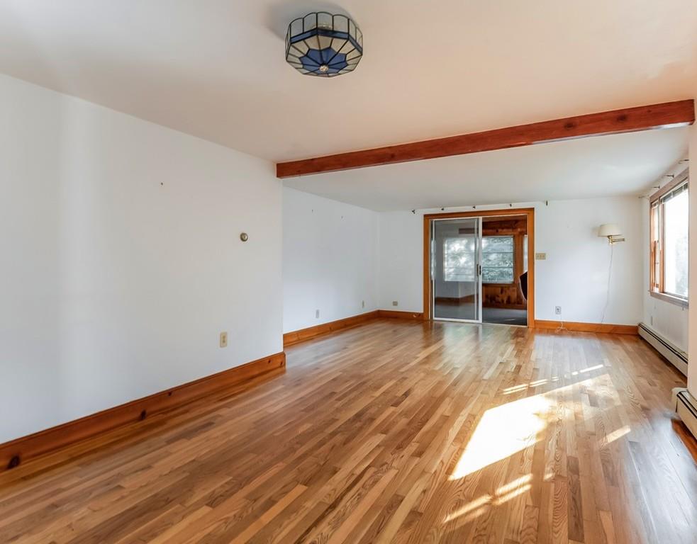 17 Nashoba Road Acton, MA 01720 - Photo 4 of 26 a view of empty room with wooden floor