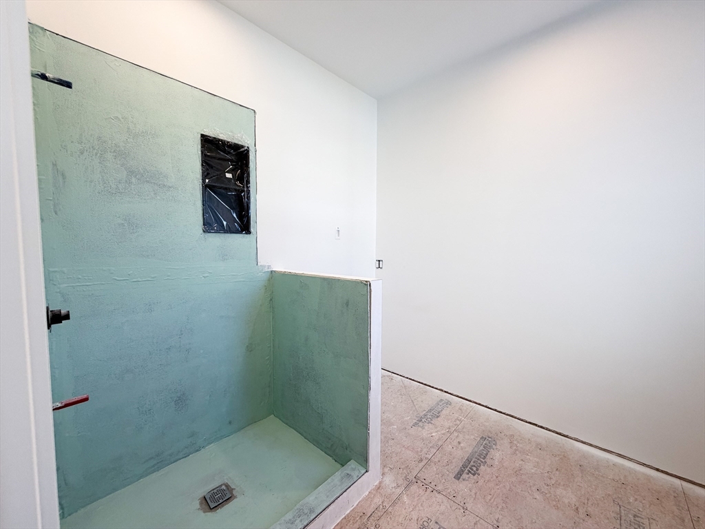 4 Oneil Way Saugus, MA 01906 - Photo 12 of 42 a bathroom with a shower