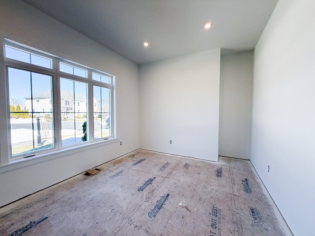 4 Oneil Way Saugus, MA 01906 - Photo 13 of 42 an empty room with a empty space and windows