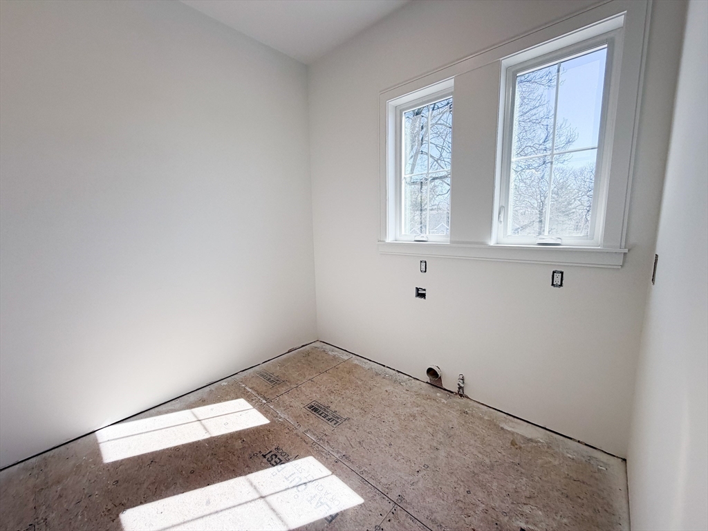 4 Oneil Way Saugus, MA 01906 - Photo 9 of 42 a room that has a window in it