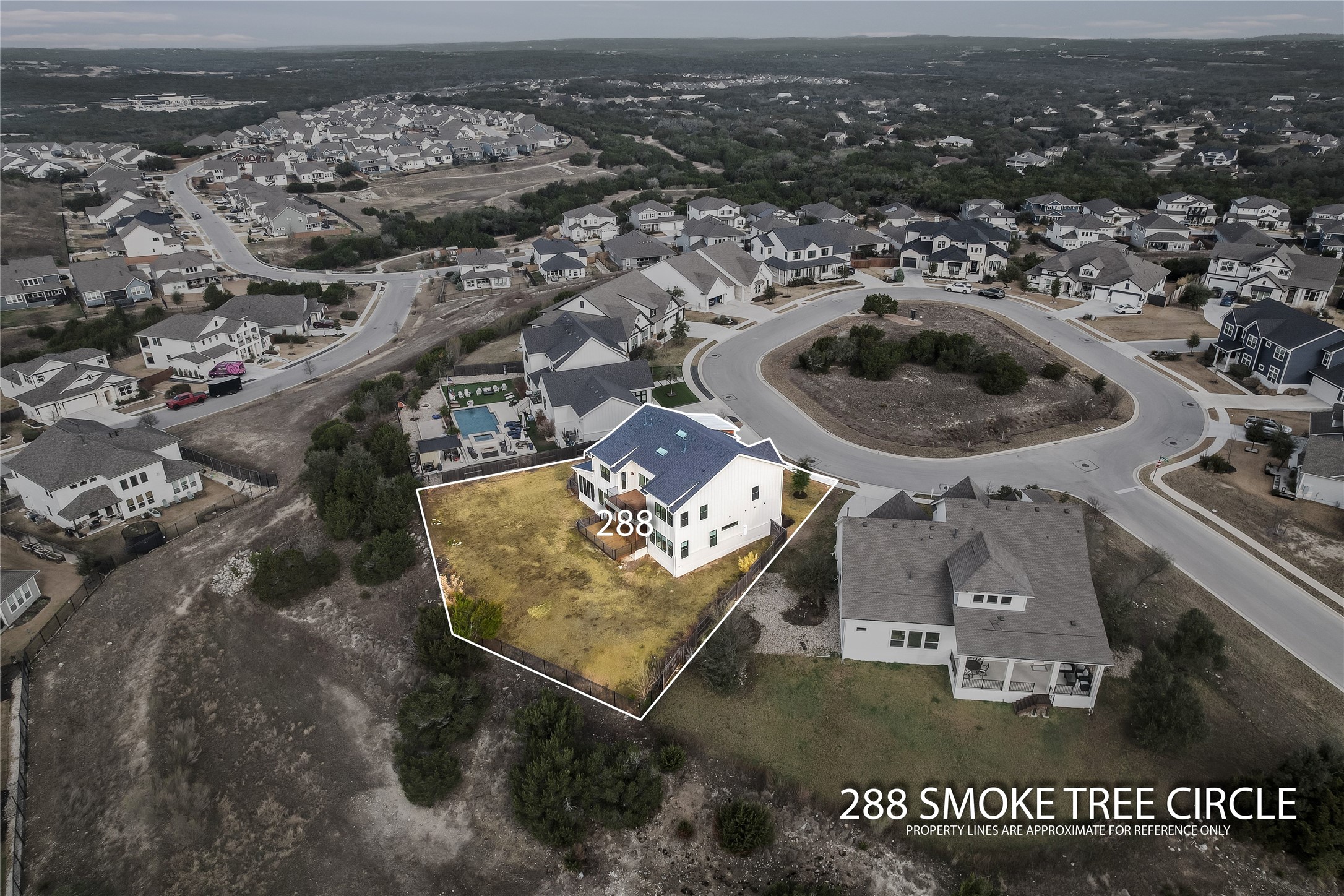288 Smoke Tree Circle Dripping Springs, TX 78620 - Photo 39 of 40 an aerial view of residential houses with outdoor space