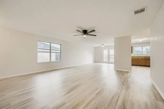 a bathroom with a granite countertop sink mirror and double