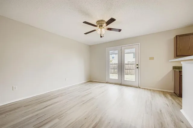 a kitchen with stainless steel appliances a stove a microwave and cabinets